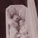 Twins in coffin